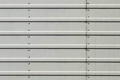 full frame of striped corrugated metal sheet texture Stock Photo by  LightFieldStudios