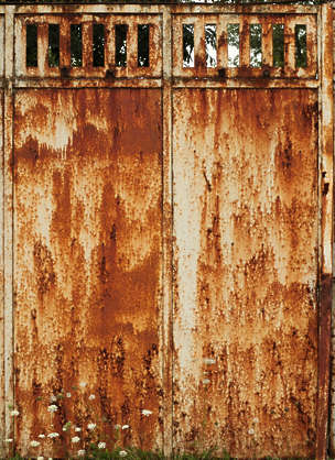 repairing garage door rust