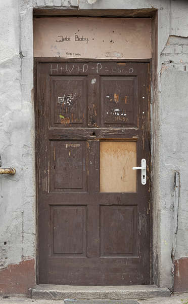 single 8ft tall steel door with extra tall wrought iron